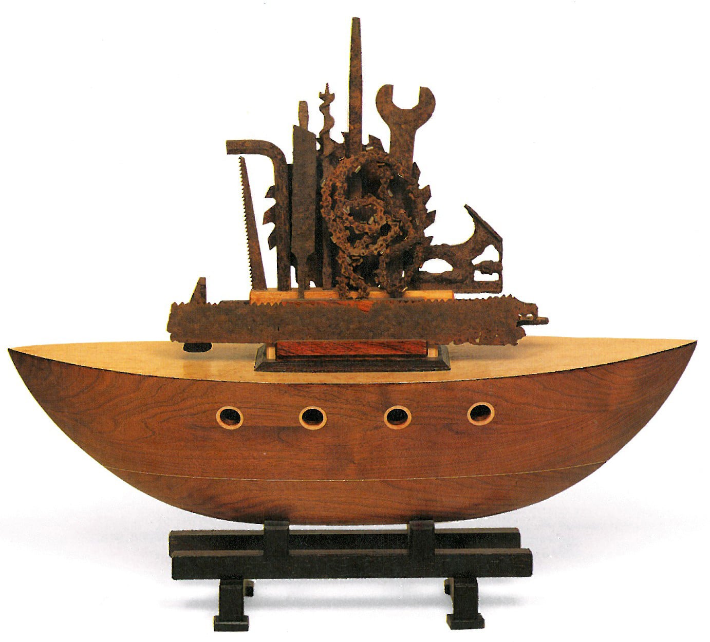 <b>Richard Bronk,</b><i> Ship of Tools,</i> 1992, Wood and metal, 22” x 25” x 8” Image courtesy of IA&A, © Richard Bronk.